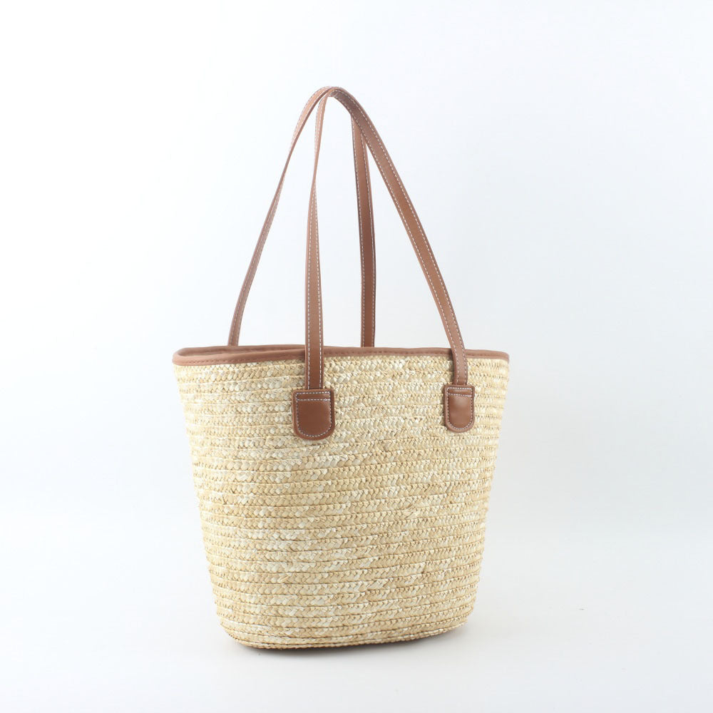 Braided basket bag with elegant leather handles Stornfield