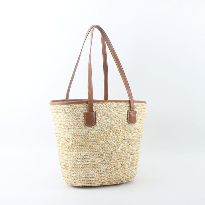 Braided basket bag with elegant leather handles Stornfield