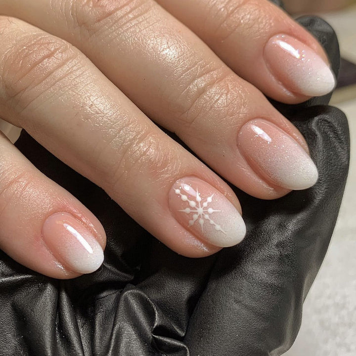 Artful Nail Extensions with Glitter and Snowflake Design Stornfield
