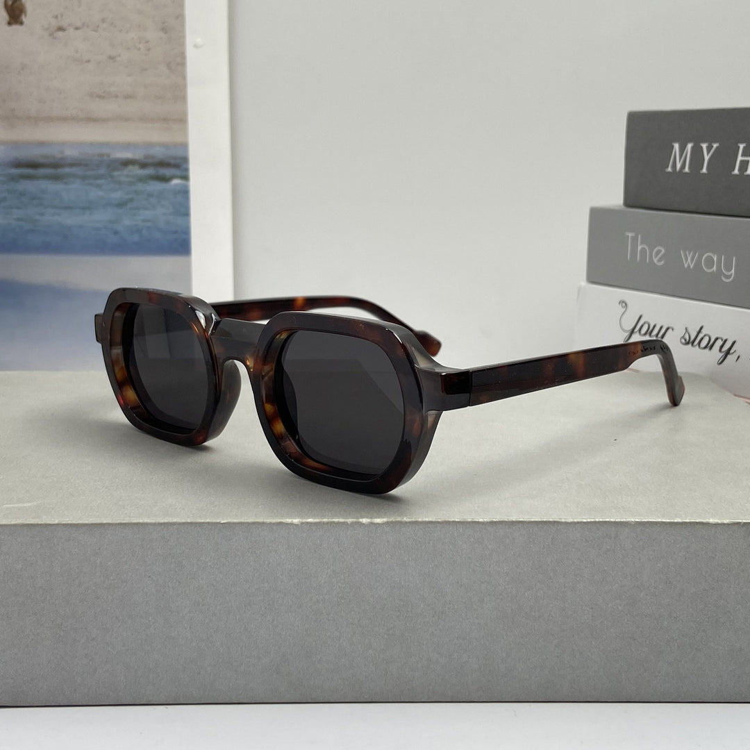 Women’s fashionable sunglasses in modern design with wide frame Stornfield
