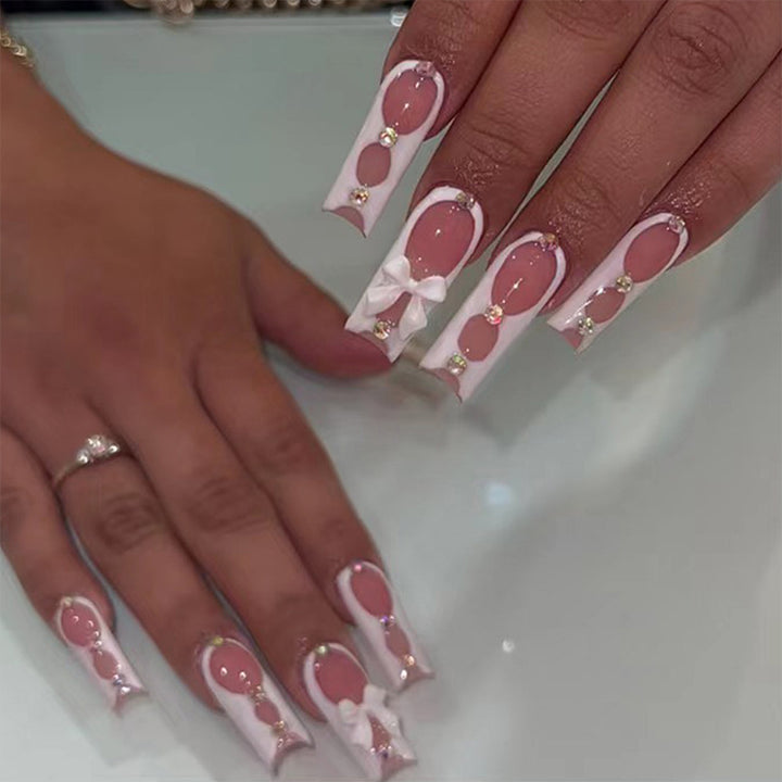 Elegant and artistic nail art with rhinestone details Stornfield