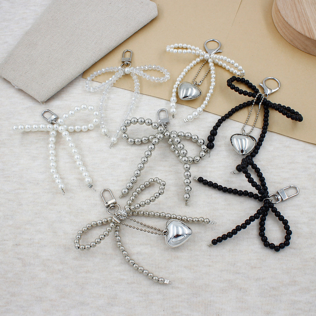 Elegant Pearl Bow Keychain Stornfield