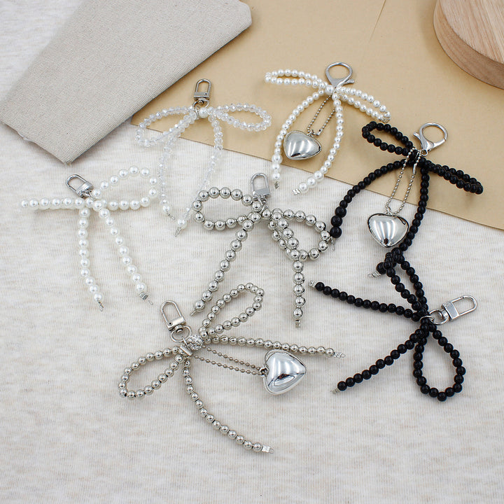 Elegant Pearl Bow Keychain Stornfield