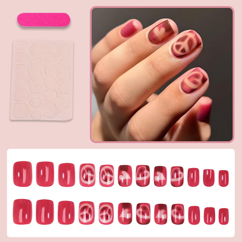 Acrylic nail set with elegant heart and pattern designs Stornfield