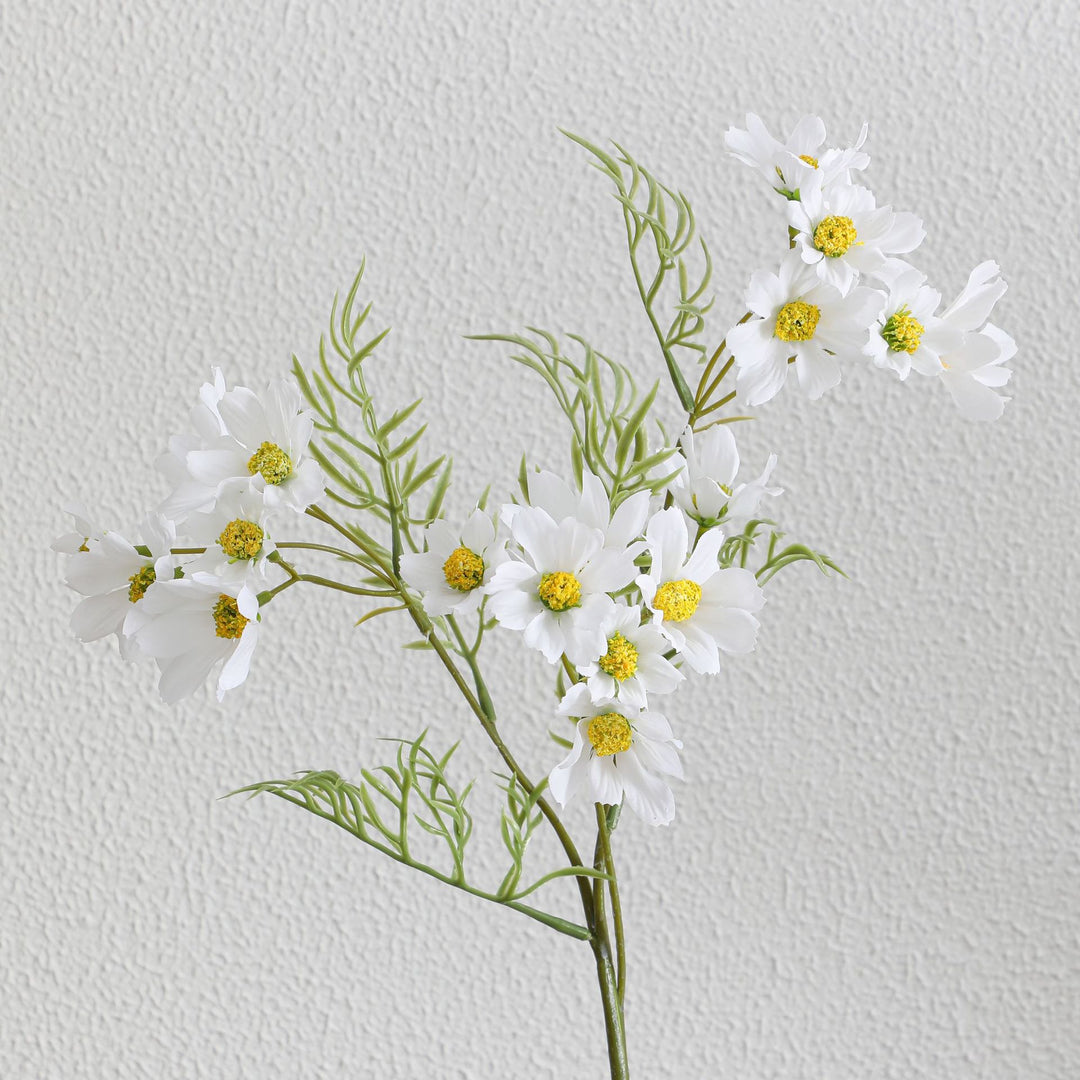 Artificial flower branch with bright pink flowers