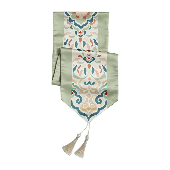 Decorative table runner with oriental tile pattern and tassels Stornfield