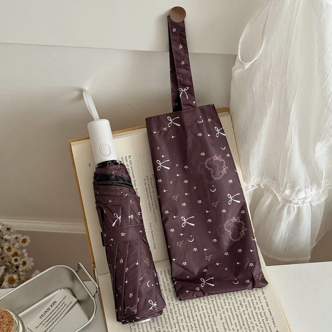 Women's folding umbrella with elegant pendant design Stornfield