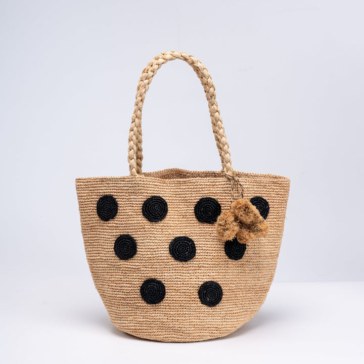 Handcrafted straw bag with eye-catching accents Stornfield