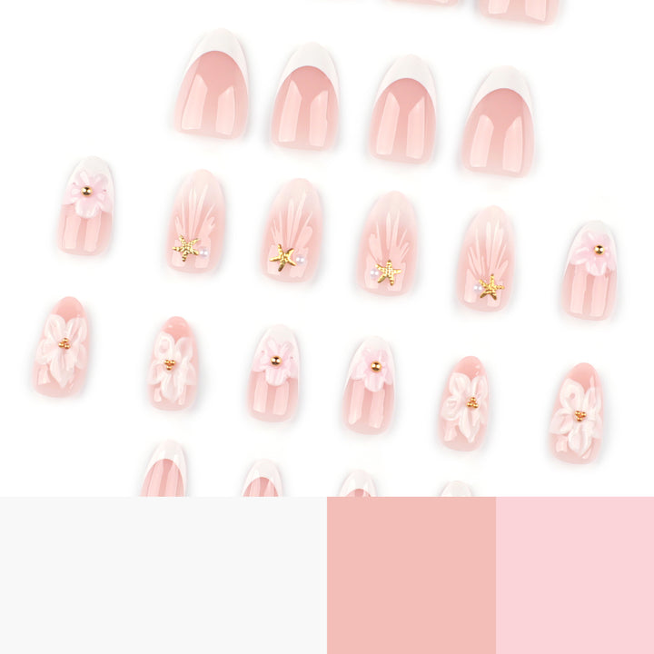 Elegant artificial nails with floral design and glitter accents Stornfield