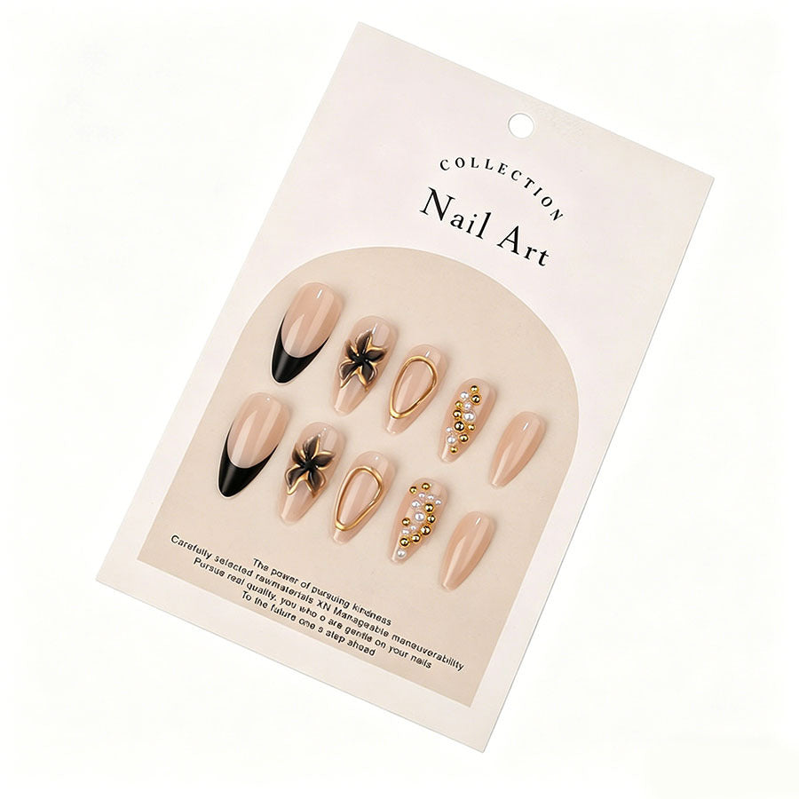 Elegant artificial nails with pearl and gold accents Stornfield