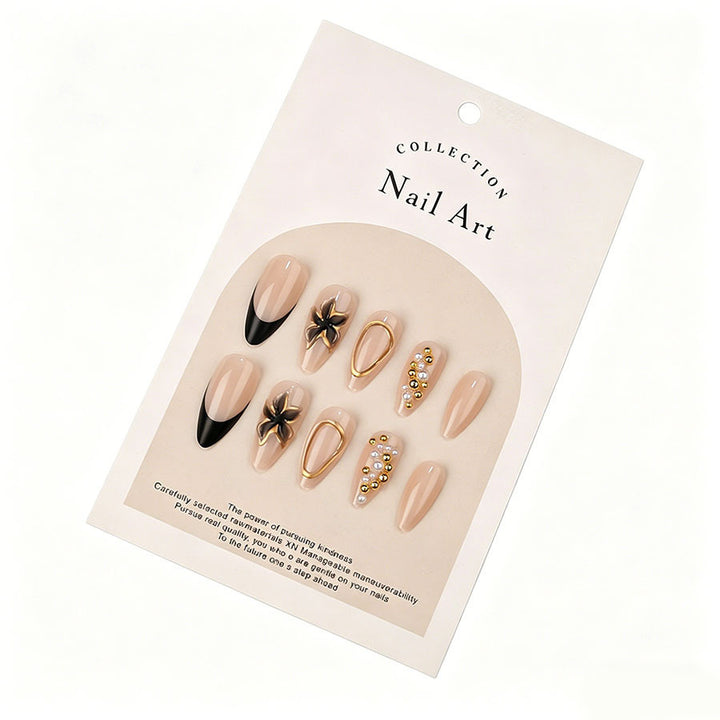 Elegant artificial nails with pearl and gold accents Stornfield