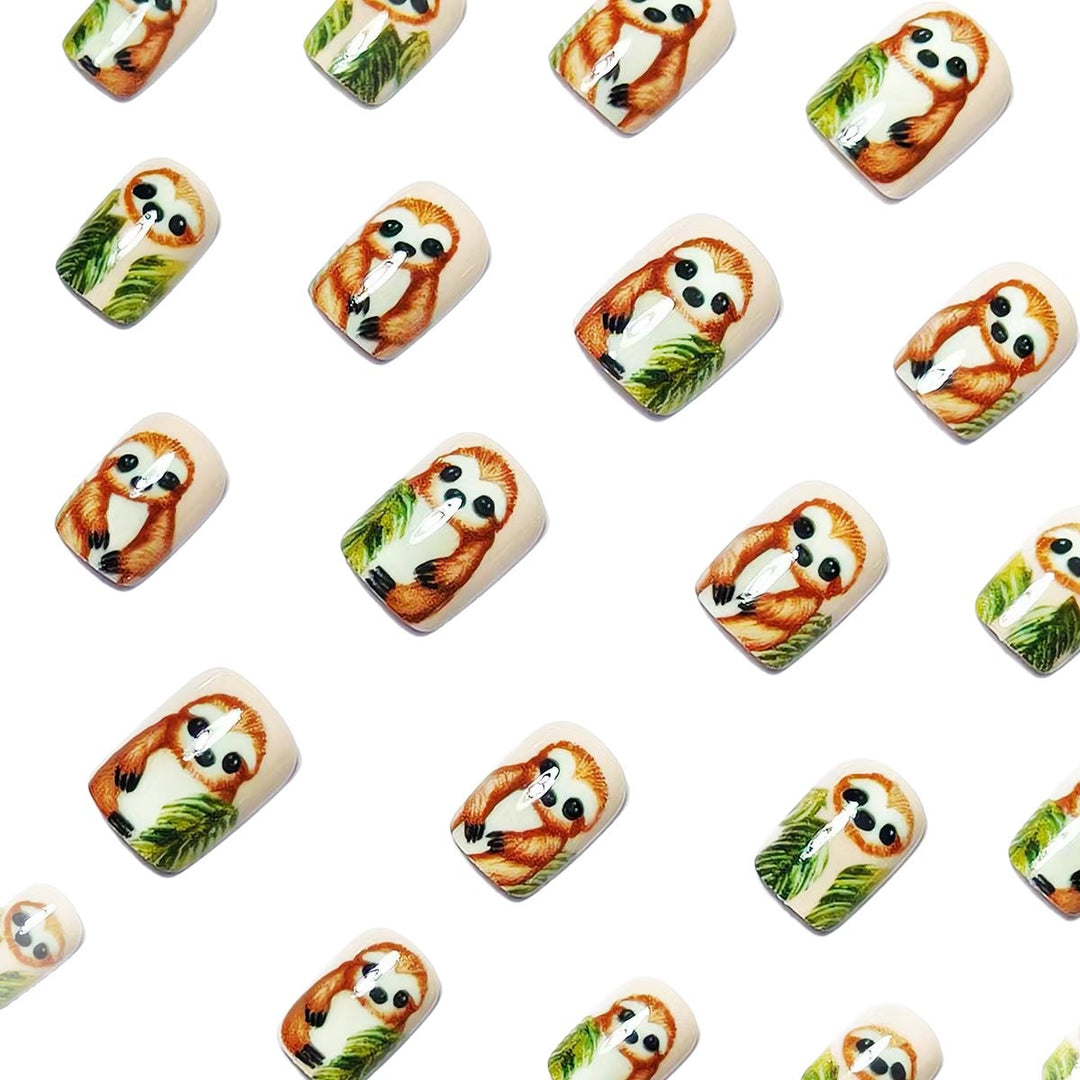 Art nails with cute sloth and leaf design Stornfield