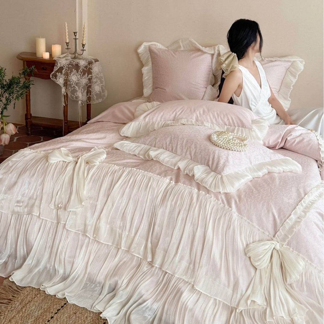 Elegant pleated bed set with gathered bed skirt and decorative pillows