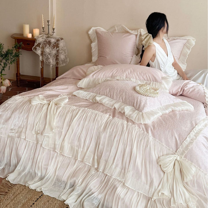 Elegant pleated bed set with gathered bed skirt and decorative pillows