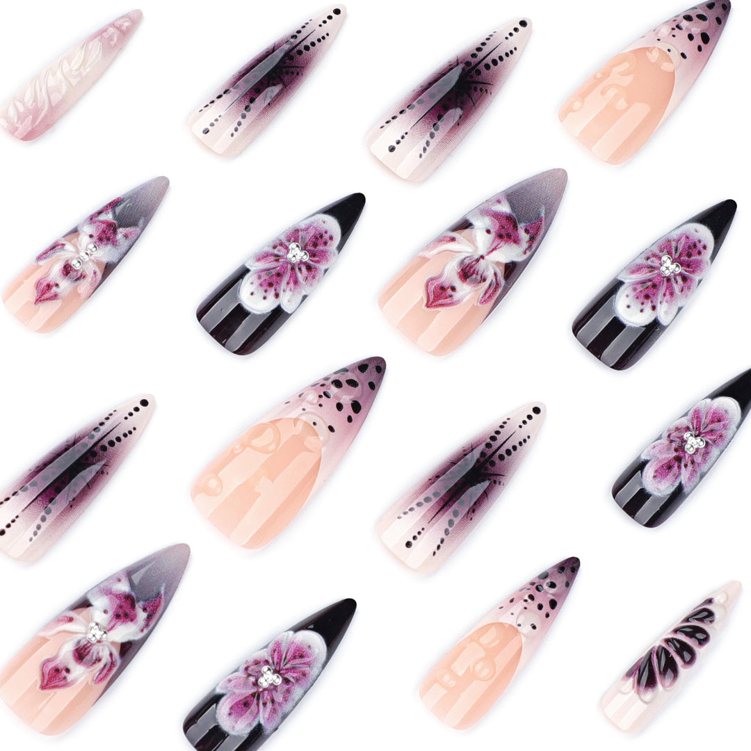 Artistic stiletto nails with floral 3D embellishments Stornfield