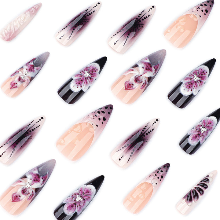Artistic stiletto nails with floral 3D embellishments Stornfield