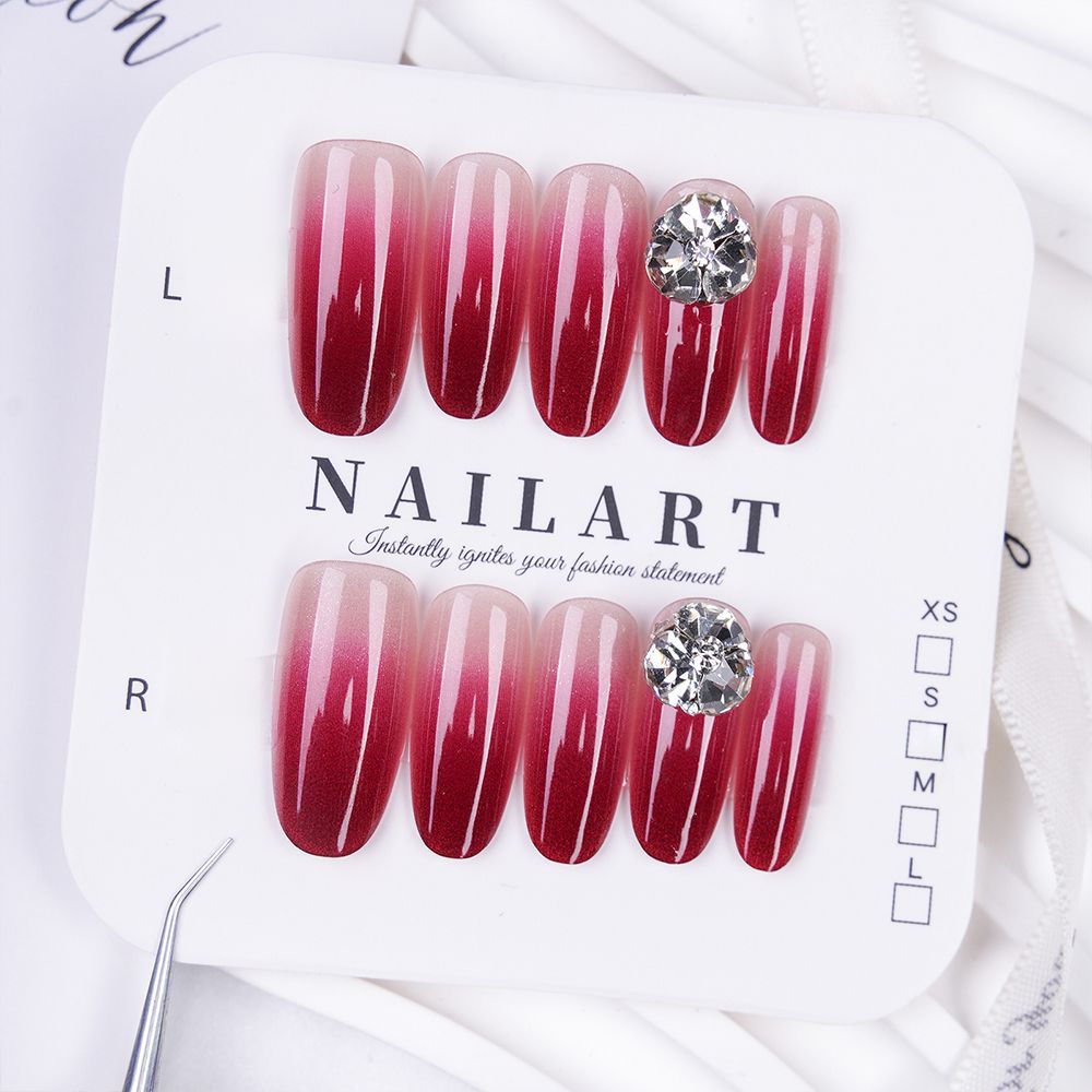 Artificial nails with elegant ombre effect and rhinestone decoration Stornfield