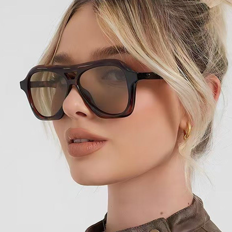 Ladies fashionable sunglasses in innovative design with wide frame Stornfield