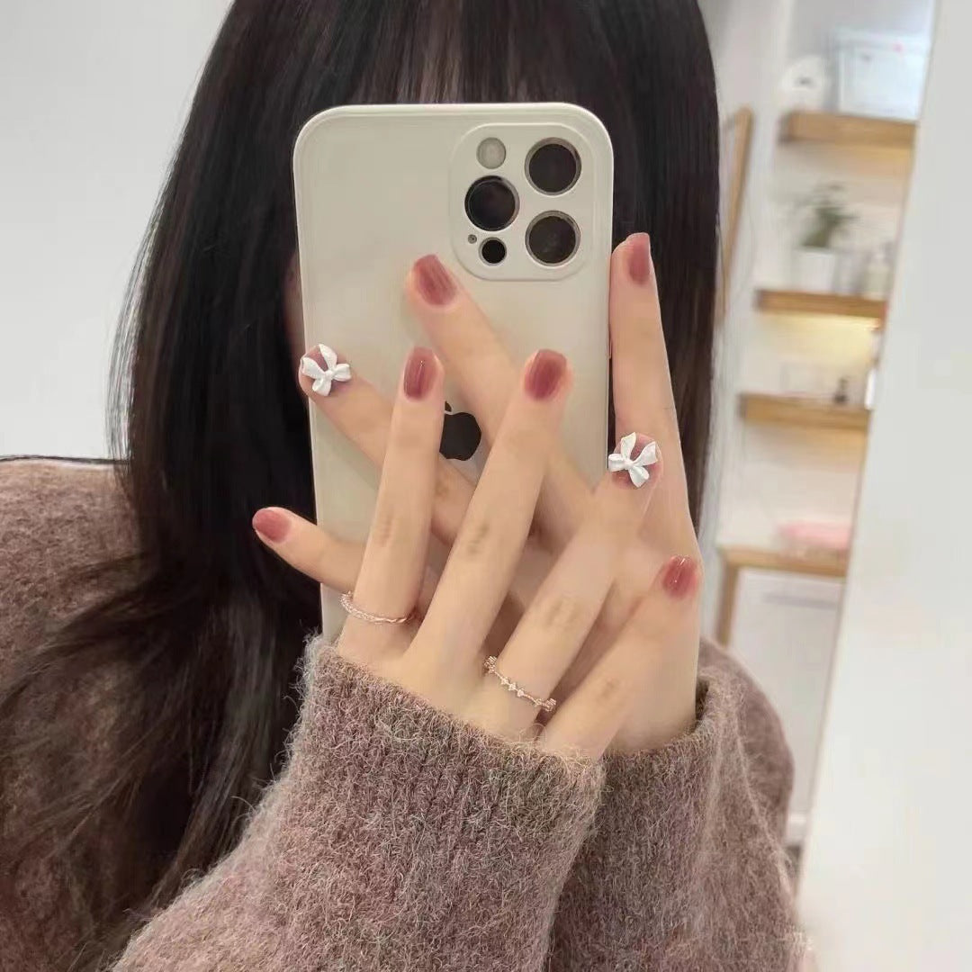 Elegant artificial nails with delicate flower accents Stornfield