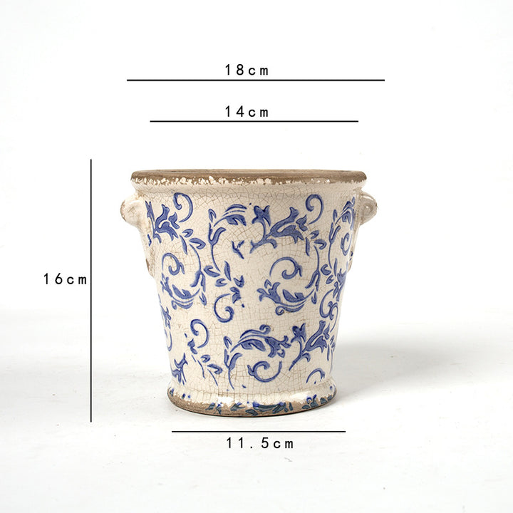 Decorative flower pot with floral embellishments Stornfield