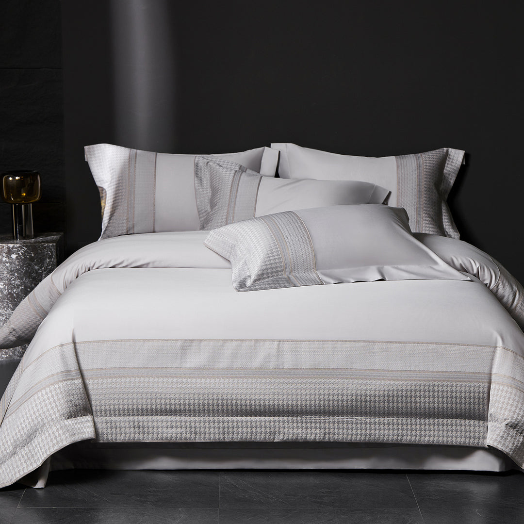 Luxurious cotton satin bedding set with houndstooth jacquard border and pillowcases