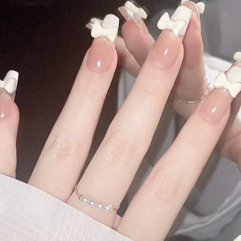 Elegant nail design with pearl embellishment Stornfield