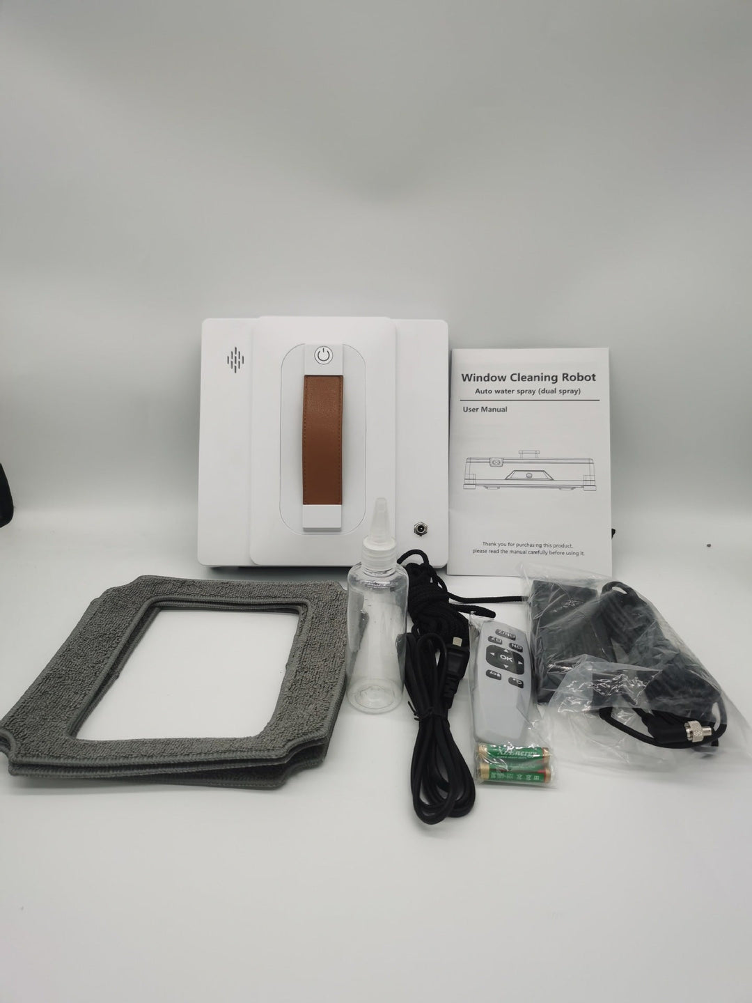 robotic window cleaner with dual water spray system and microfiber pads Stornfield