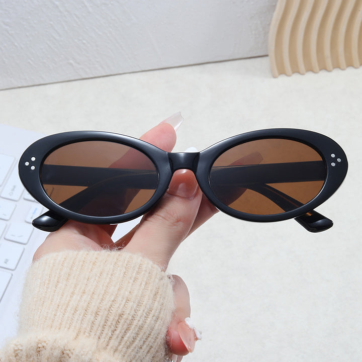 Ladies fashionable sunglasses in elegant oval design Stornfield