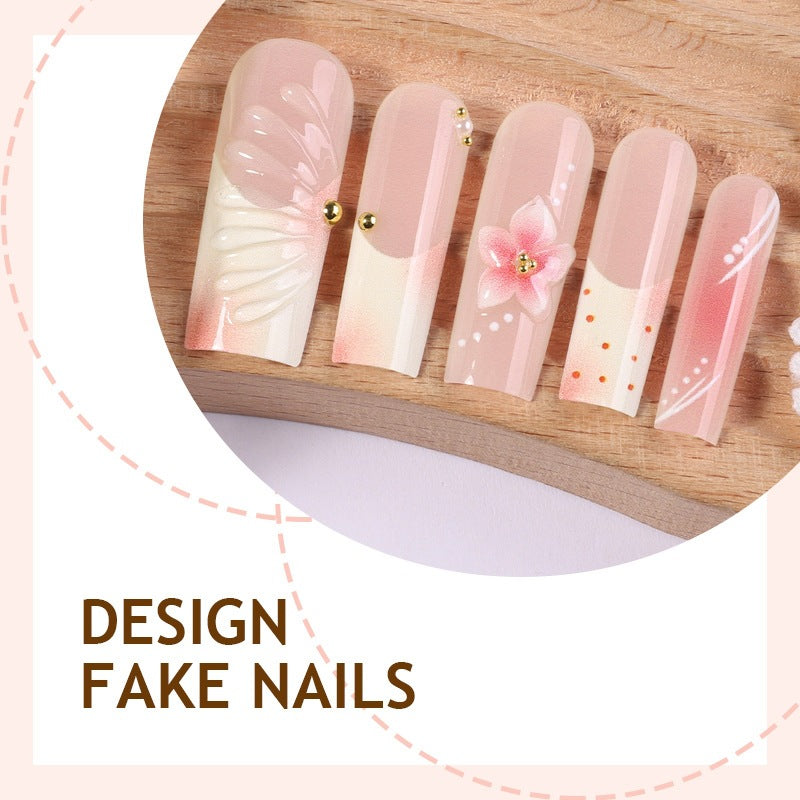 Creative nail art set with floral accents and glitter details Stornfield