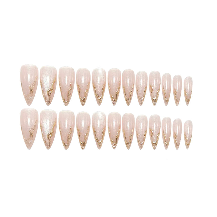 Artificial nails in elegant stiletto design with golden accents Stornfield