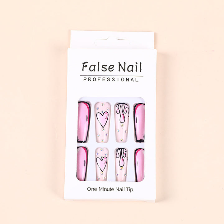 Eye-catching artificial nails with soulful heart design and glamorous accents Stornfield