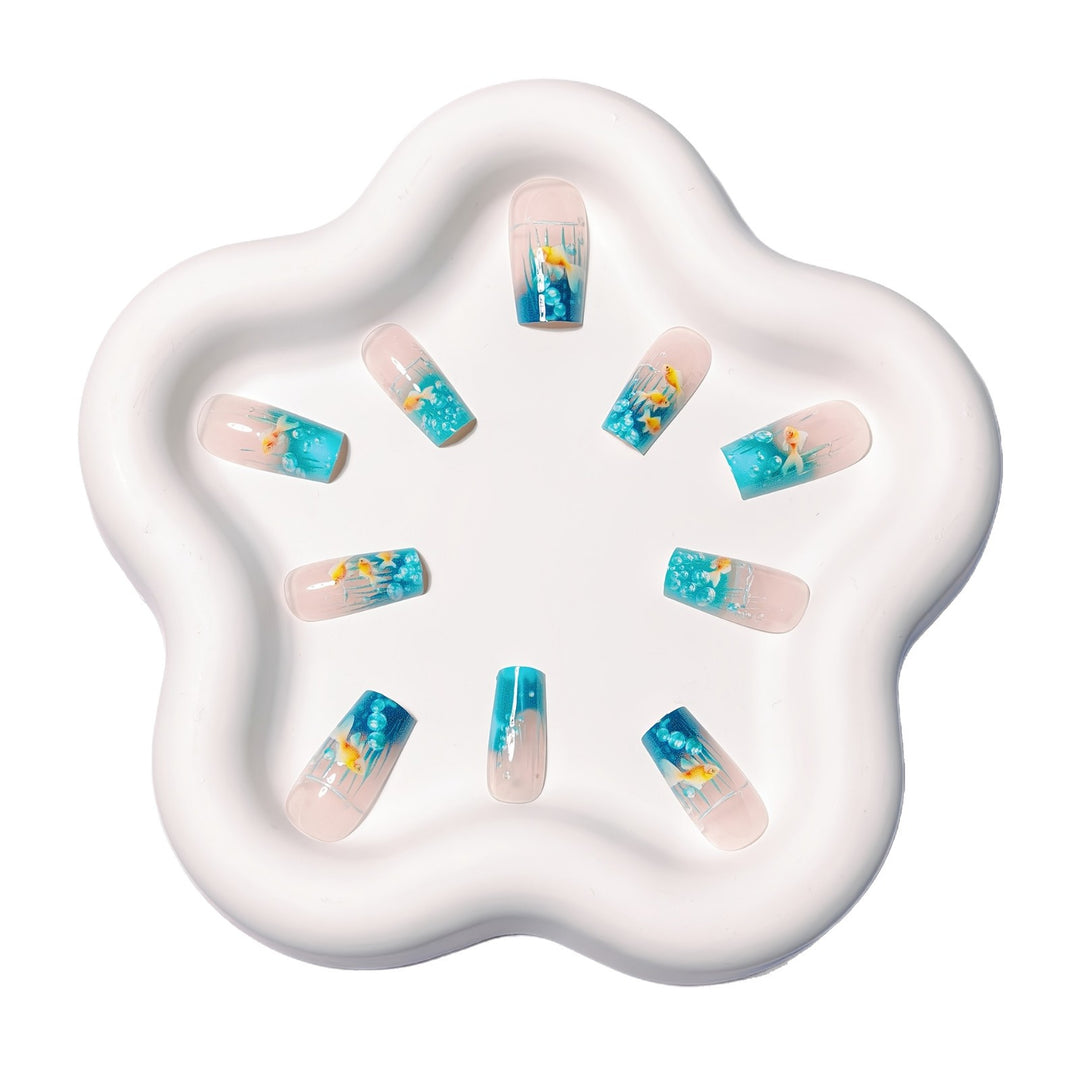 Creative art nails with maritime goldfish design Stornfield