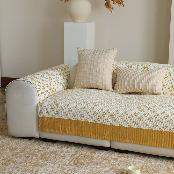 Sofa cover and sofa runner made of knitted cotton blend with non-slip edge