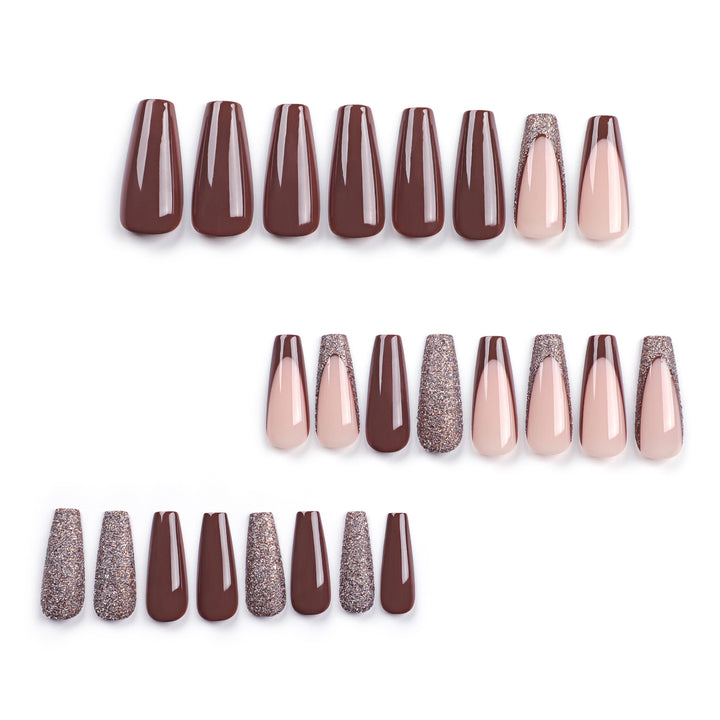 Artful stiletto nails with glitter embellishments Stornfield