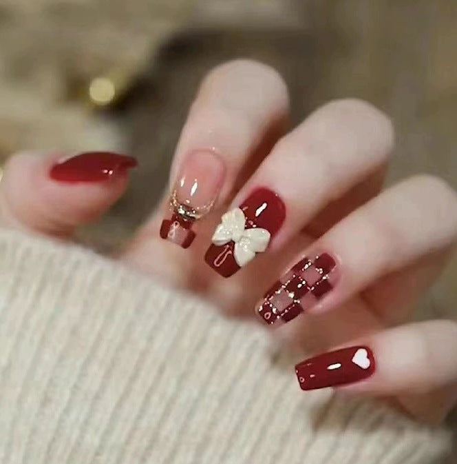 Elegant nail design with pearl embellishment Stornfield