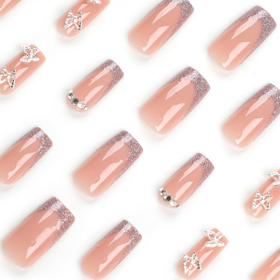 Artful Nail Extensions with Glitter and Decorative Accents Stornfield
