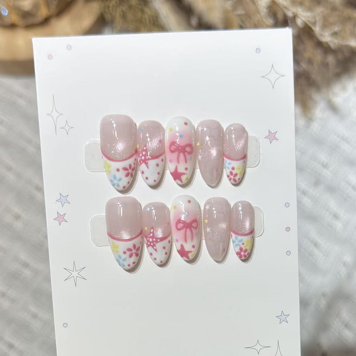 Artistic Press-On Nail Art Set with Charming Star and Bow Designs Stornfield
