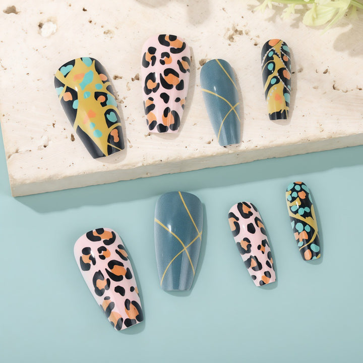 Creative artificial nails in modern animal print design Stornfield