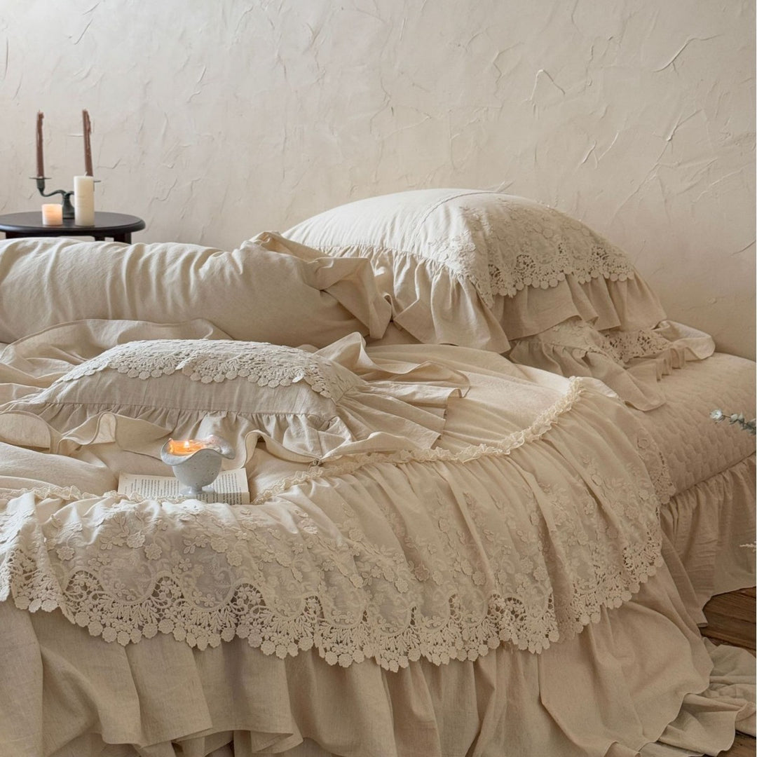 Vintage-inspired duvet cover set with layered ruffles and lace appliqué