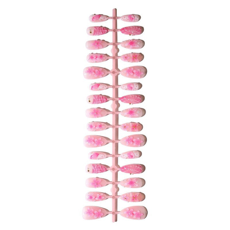 Artificial nail set with intricate 3D flowers and elegant accents Stornfield