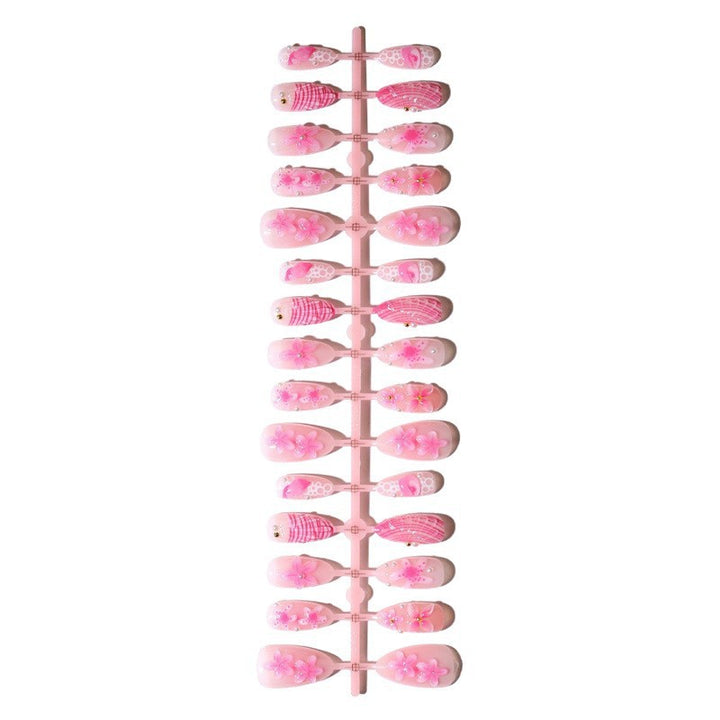 Artificial nail set with intricate 3D flowers and elegant accents Stornfield
