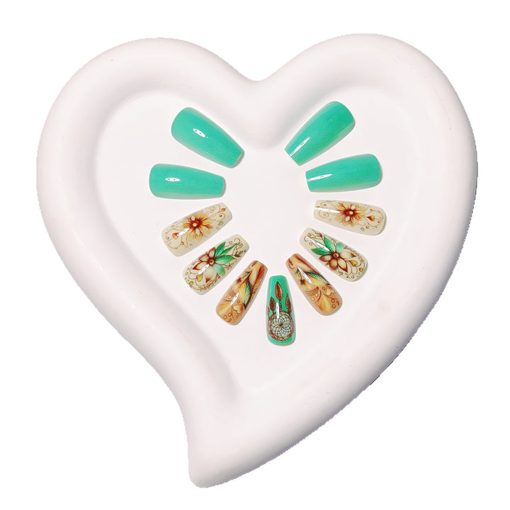 Creative artificial nails with floral and dreamcatcher design elements Stornfield