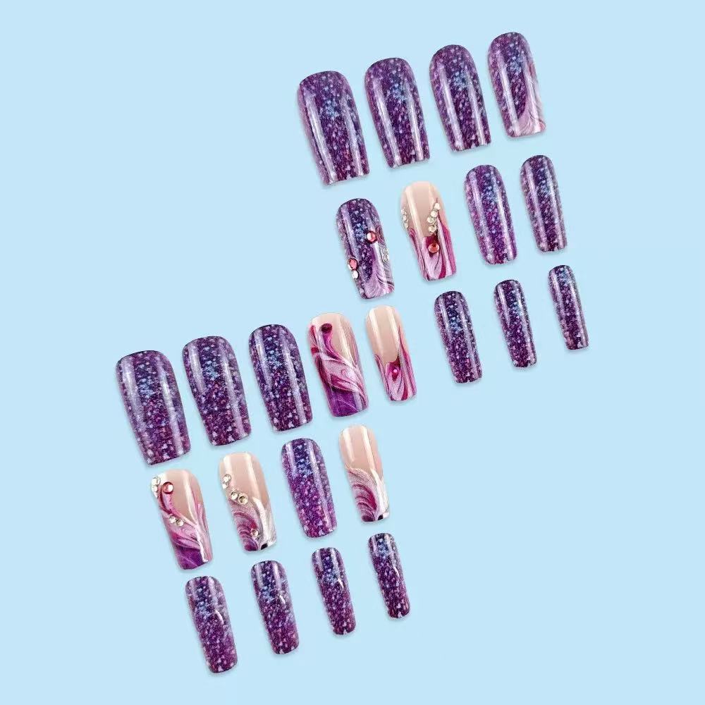 Acrylic nail set with luxurious color gradients and sparkling accents Stornfield