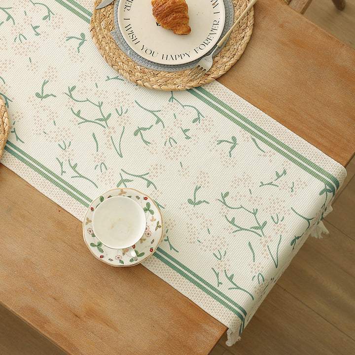 decorative table runner made of woven cotton with tassels Stornfield