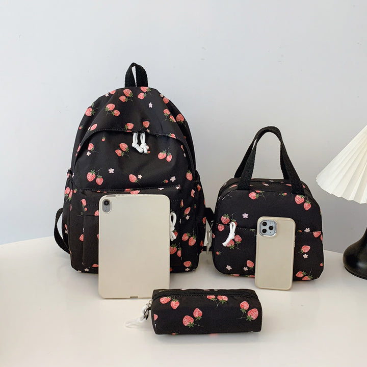 Backpack set with cheerful strawberry pattern and practical compartments Stornfield