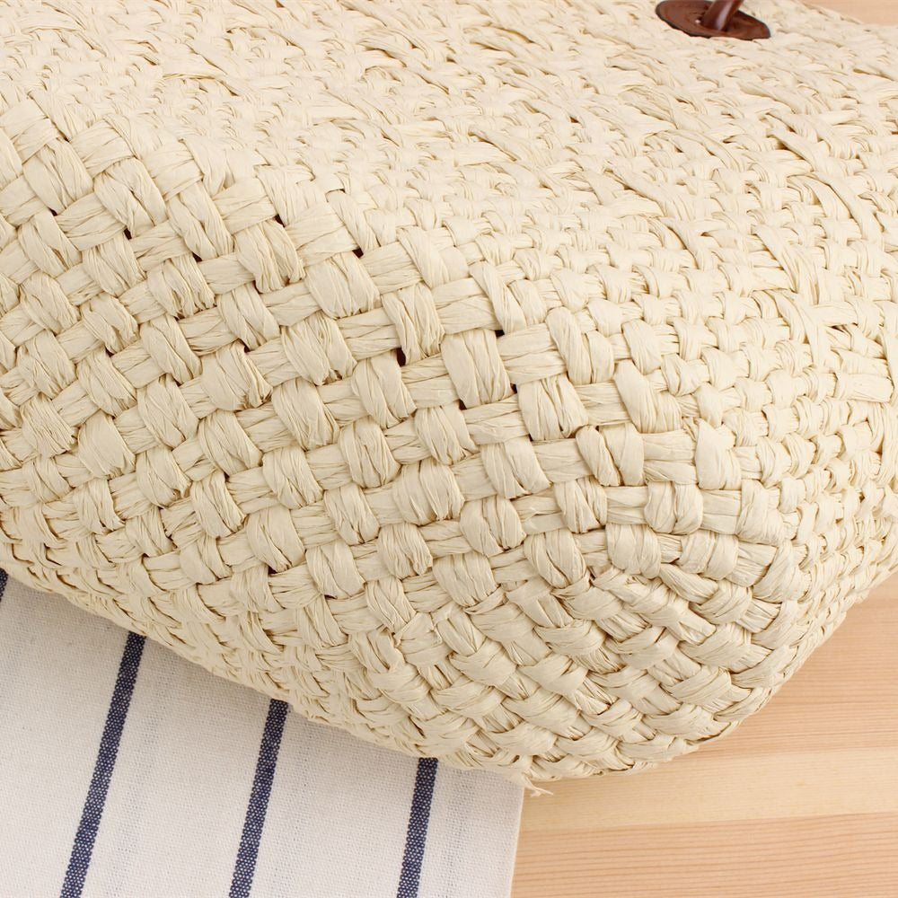 Beach bag made of high-quality braided straw with stylish leather handles Stornfield