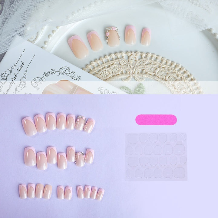 Artificial nails with romantic pink tips Stornfield