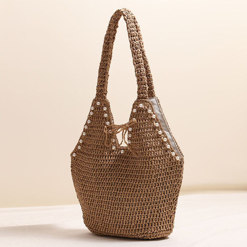 Handbag with pearl decor and innovative closure Stornfield