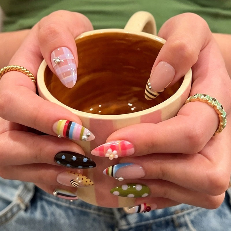 Acrylic nail set with colorful patterns and creative designs Stornfield