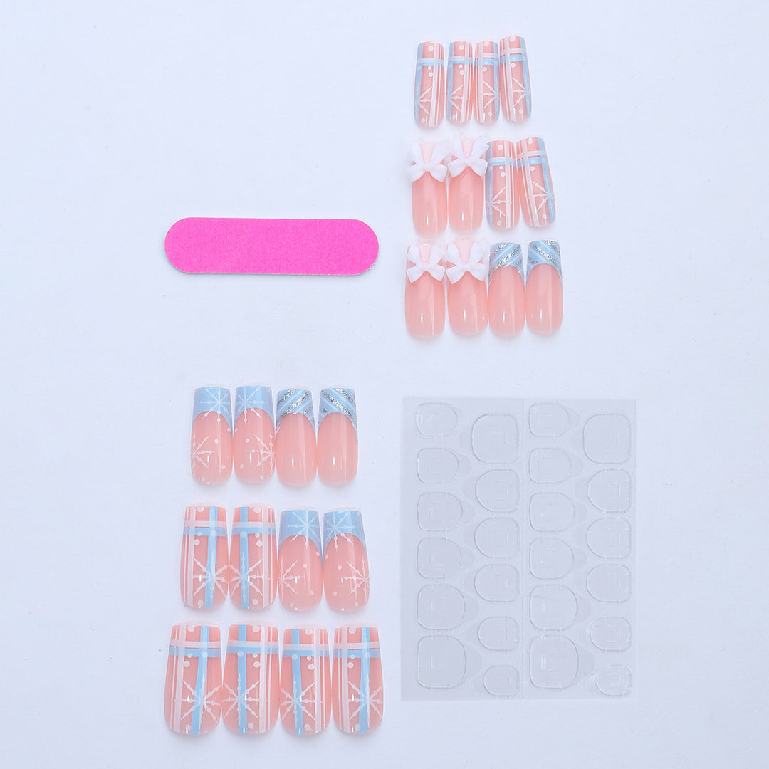 Artificial nail set with winter snowflake and bow motifs Stornfield